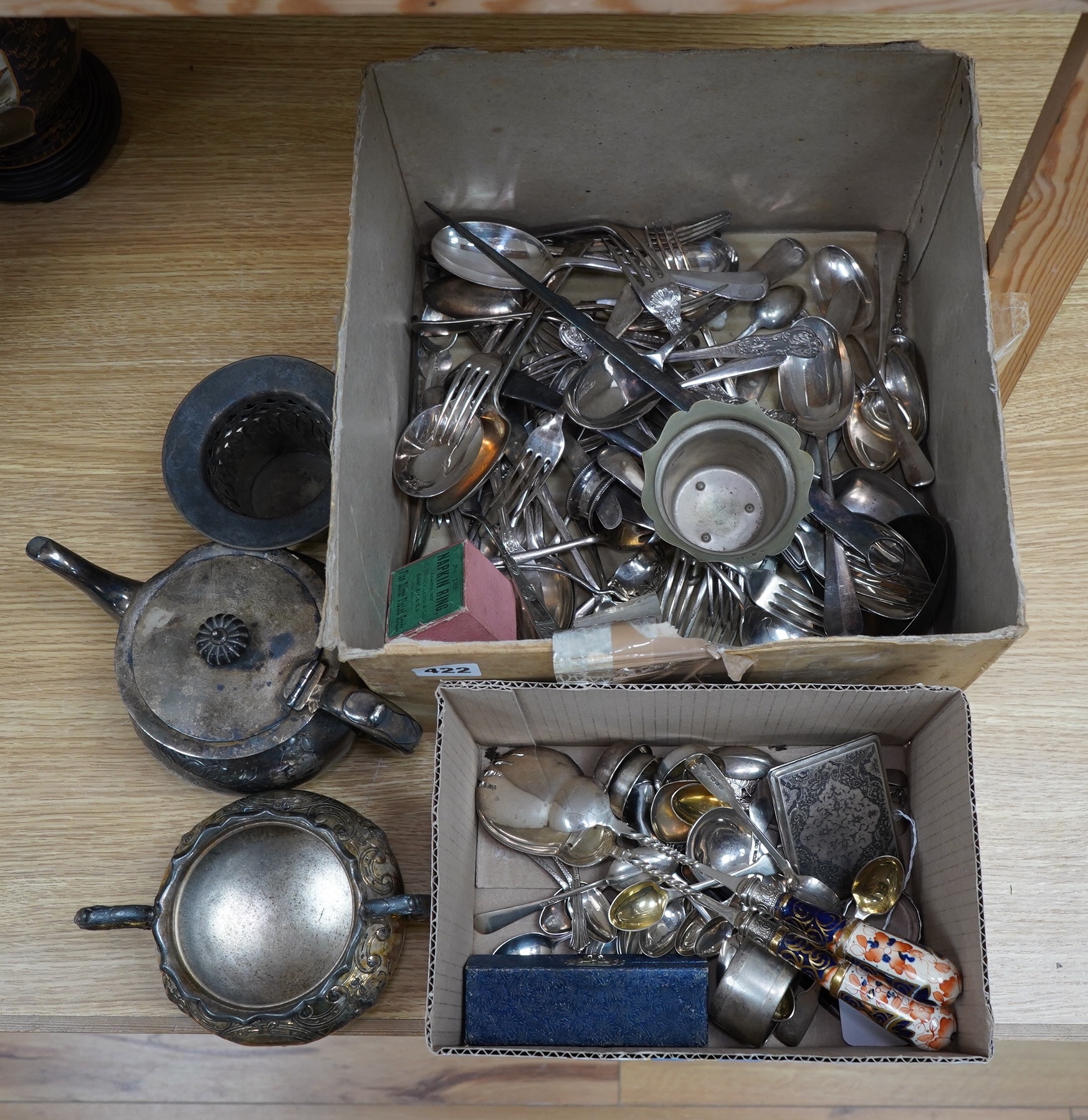 A small quantity of silver flatware, assorted plated cutlery, napkin rings and servers. Condition - varies, mostly fair